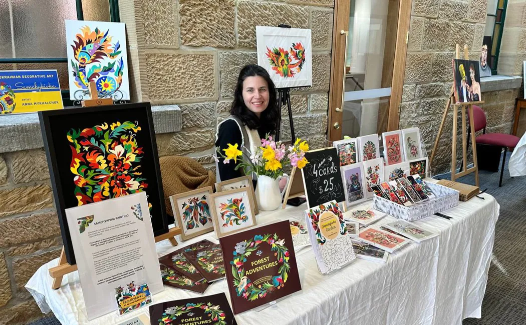 Australia. Anna Mykhalchuk At Her Stall At The Salamanca Markets, Hobart.