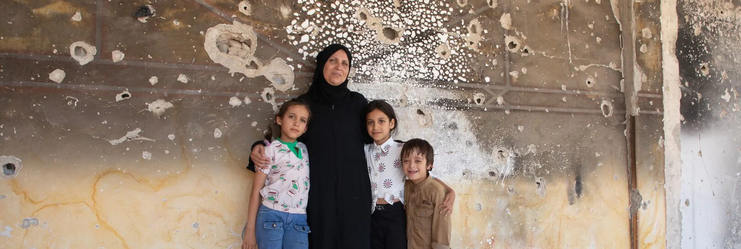 Syria_Basmah-and-Islam-in-their-damaged-home