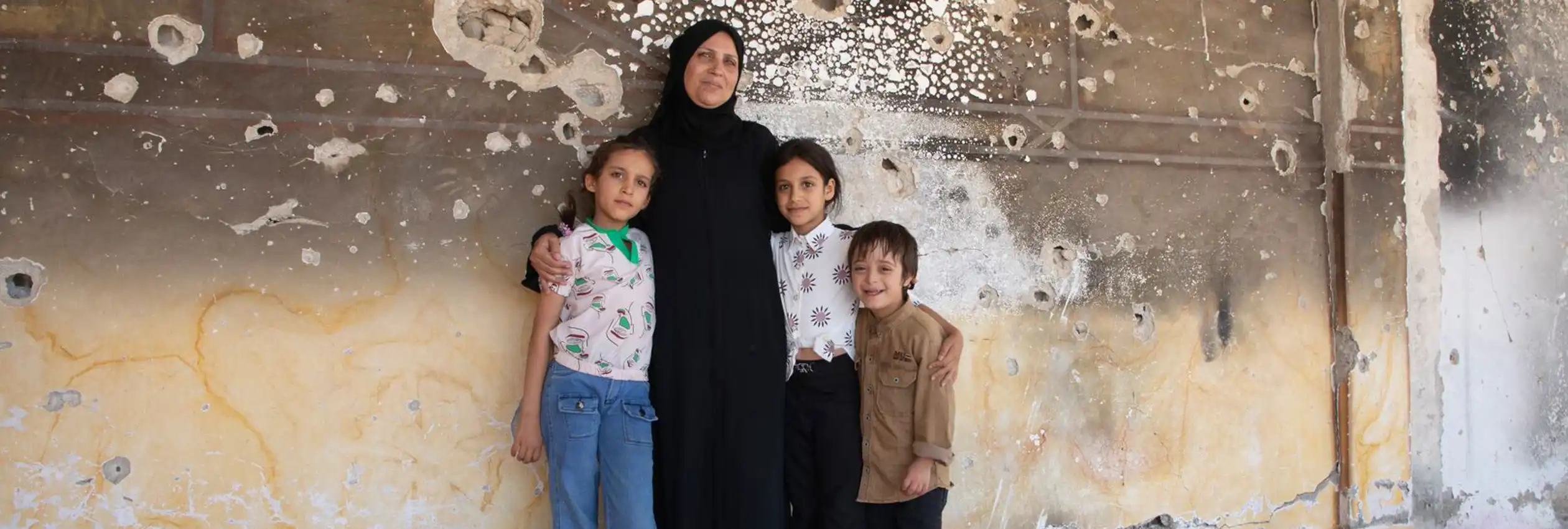 Syria_Basmah-and-Islam-in-their-damaged-home