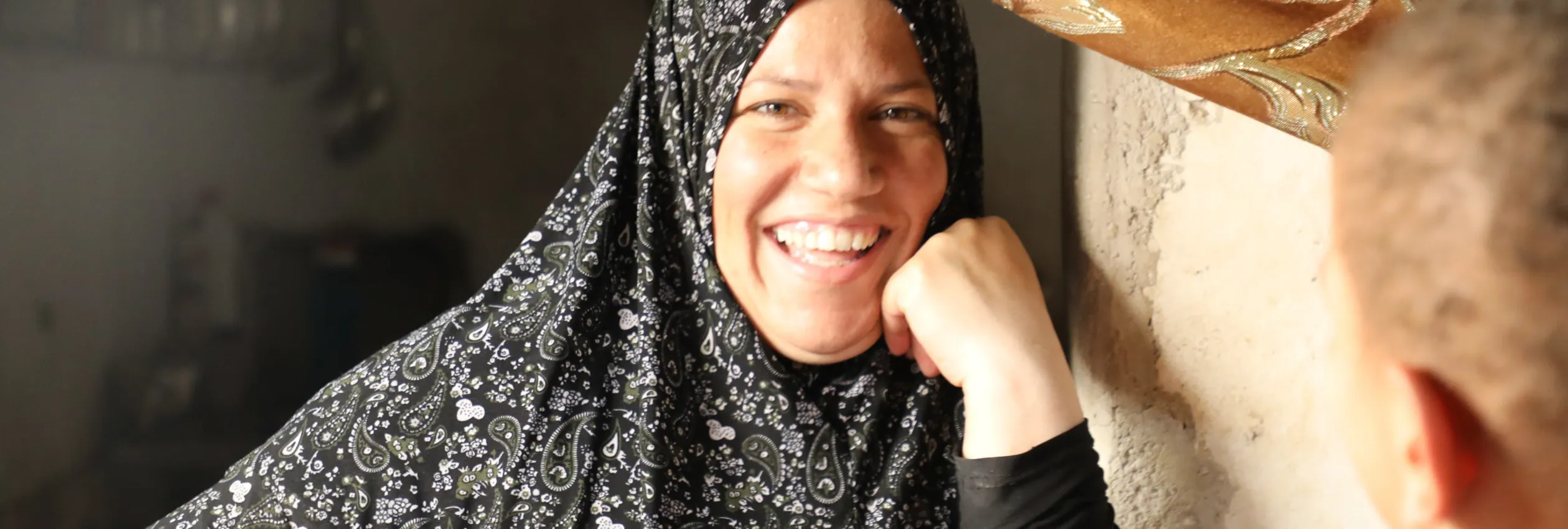 Zahra, a Syrian refugee with five children, is pictured at home in Mafraq.